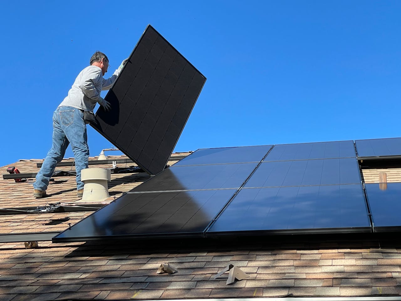 Man Installing Solar Panels